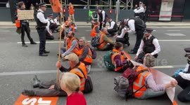 Just Stop Oil demonstrators block road where UK Department for Business, Energy and Industrial Strategy is based