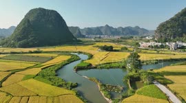 Footage Of Farmland Surrounded By Mountains in Chongzuo, China