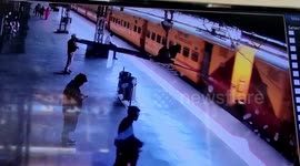 Platform guard's vigilance helps rescue teenage girl who slipped while boarding train in central India