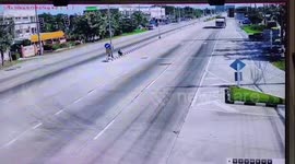 Out-of-control truck barrels over highway divider while avoiding cars in Thailand