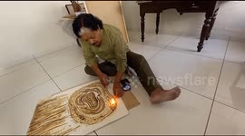 Meet the unique artist of India who does not paint with paint but with fire, Kamal Rana; He has created the World's biggest 7 feet long and 63 feet wide fire painting.