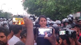 Swasthika Arulingam gives speech at the protest march against oppression in Colombo, Sri Lanka