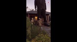 Man encounters GIGANTIC, 30-feet tall Frankenstein Monster statue while touring Halloween houses