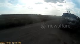 Russian military vehicle overturned on the move with soldiers during the retreat