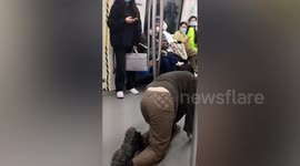 Woman filmed crawling through train carriage in China