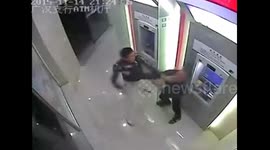 Robber sneaks up behind man at cash machine... gets horribly beaten up