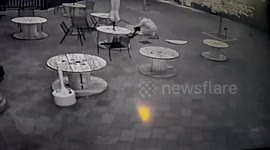 Man tries parkour on pub beer garden tables... fails badly