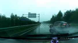 Dashcam footage of crash with spinning car on slippery highway