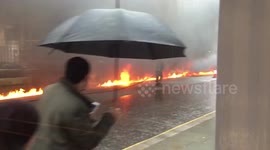 Fire trail spreads down London street after car blaze