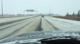 Snow causes poor road conditions in Winnipeg, Canada