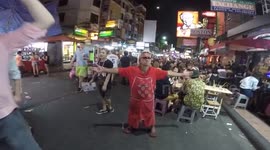 Electro food seller dances on Thailand street