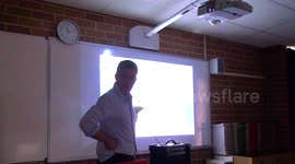 Science Teacher makes weird discovery...hidden sound signal in light from a data projector