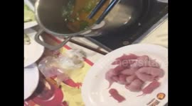 Live mice to be eaten with sauce after simmered in hot pot
