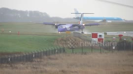 Plane struggles to land in UK storm