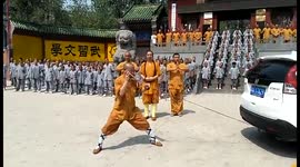 Shaolin monk pulls SUV with his ear