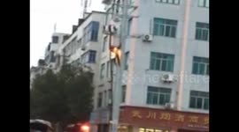 Man climbs electricity pole and bursts into flames after suffering electric shock