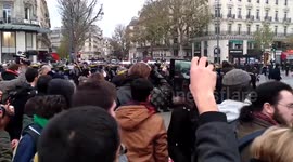 Riot police intervene during climate change public gathering in Paris