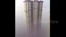 High-rise residents lost in the smog in China