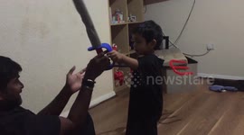 Toddler won't attack dad with toy weapon because he is unarmed