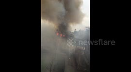 Plumes of smoke from Newcastle shop fire