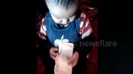 This tiny toddler can count money better than you