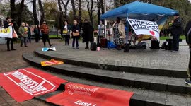 Speakers rally in Walthamstow square against deportation to Rwanda is illegal, London, UK.