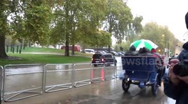 19th and 20th-century cars drive through London's Wellington Arch for annual run
