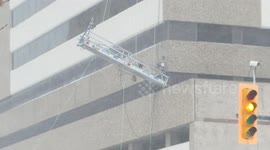 Watch moment out-of-control carriage swings against high rise during blizzard in Regina, Saskatchewan