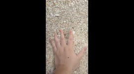 Crystal clear water with clean pebbles and amazing view island with mesmerizing see breeze  and breathable view