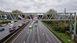 Just Stop Oil protestor climbs gantry on M25 in protest over climate change