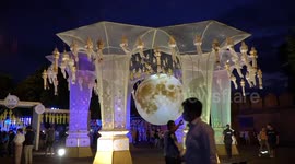 Devotees illuminate vibrant lanterns for traditional Yee Peng 'Full Moon' celebration in Thailand