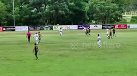 Football stand with spectators in collapses moments after kick-off