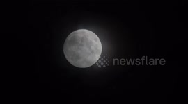 Despite a very cloudy and windy night the Full Moon was briefly seen over the sky's of Wimbledon