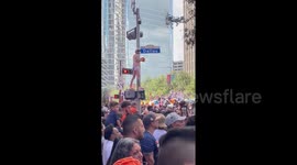 Astros parade: Man climbs traffic light pole as estimated million-plus celebrate World Series in Houston