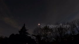Timelapse shows blood-red moon move across sky during lunar eclipse
