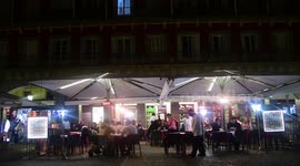 Diners eat in darkness as Madrid restaurants cut power due to rising bills