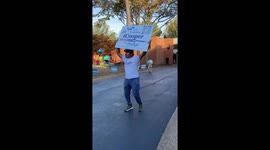 Poll worker entertain voters who head to the polls in Memphis