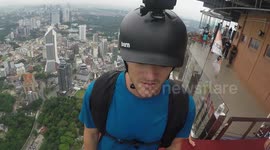 Base jumpers crash-land after mid-air collision during descent off world's 7th tallest tower