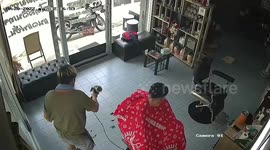 Hair dryer explodes while barber trims customer's hair