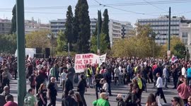 Thousands in Athens take part in day-long strike demanding higher wages