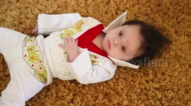 Meet the tot whose crazy hair often stops strangers in the street and is often compared to Elvis Presley's iconic quiff