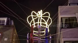 Dancing under the giant Crown at Carnaby Christmas 25th anniversary in Londons Soho