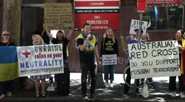 Ukrainians and their supporters protest against the Red Cross in Sydney, Australia