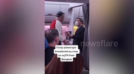 Rude passenger frogmarched off flight by police after tirade at cabin crew for bottle of water