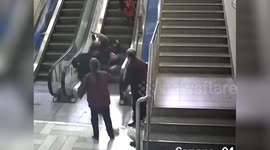 Man sprints to rescue elderly woman tumbling down escalator in China