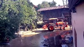 Clumsy driver shatters large clay pot with brand-new tractor