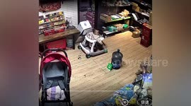 Bottled water narrowly misses infant after falling off dispenser in China