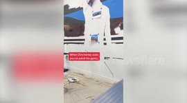 Artist creates stunning mural in Premier League star Oleksandr Zinchenko's home gym