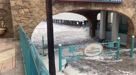 Hurricane Nicole: Seawater surges through Daytona Beach boardwalk