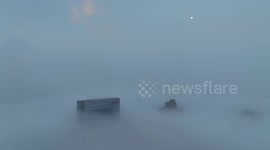 High-rise Buildings Looming in Heavy Fog in Huai'an City, China